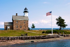 American Flag by Sheffield Island Lighthouse